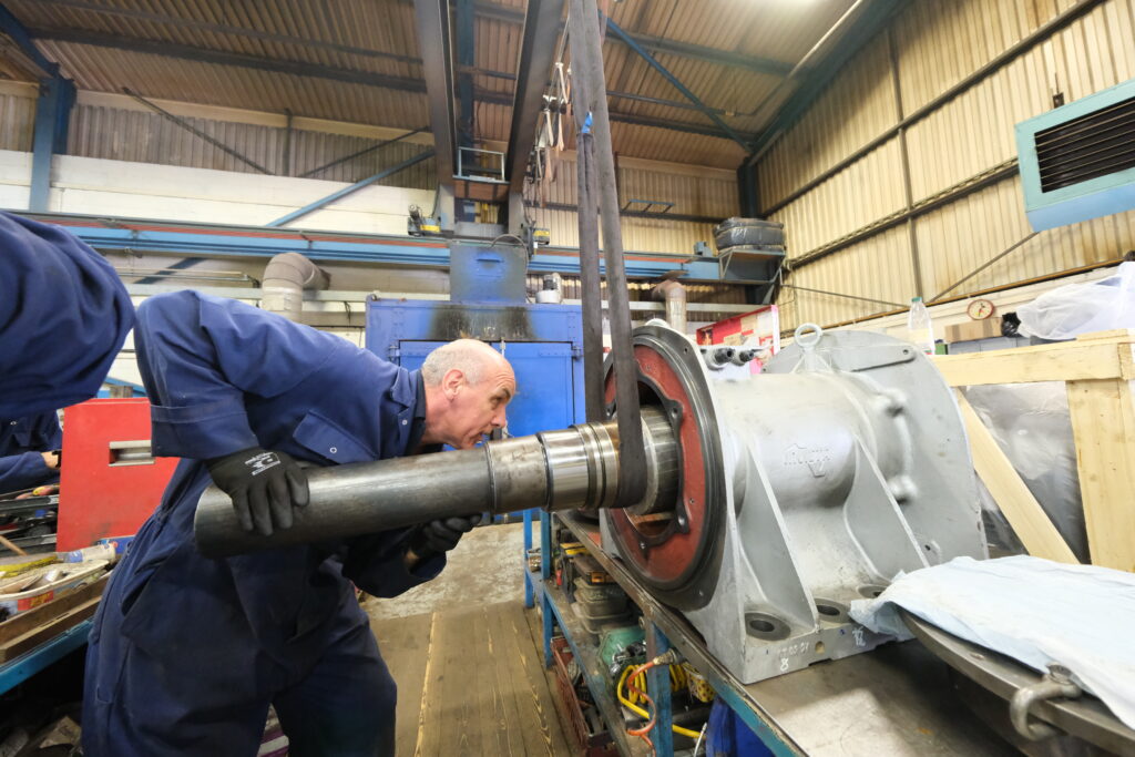 Engineer machining a gearbox output shaft in the Grantham Electrical workshop